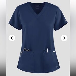 Navy Easy Stretch V-Neck Scrub set top large. Pants medium regular length.